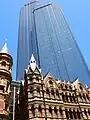 Collins Street, Melbourne  19th-century "boom style" buildings contrast with 20th-century corporate skyscrapers in urban Australia