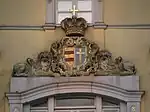 Coat of arms of the counts of Oldenburg at Oldenburg Palace: red stripes on gold for Oldenburg; golden cross on blue for Delmenhorst