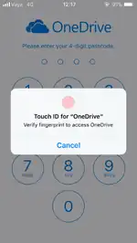 Screenshot of the passcode screen of OneDrive on iOS 11, with the prompt for Touch ID unlock displayed