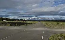 Kortbana (short runway) at former Optand wartime air base, Sweden. Notice the road becoming wider.