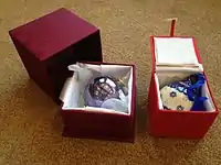 Christmas tree ornaments in storage boxes