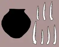 Image 20Carved catfish bones, and jar discovered in Maadi (from Prehistoric Egypt)