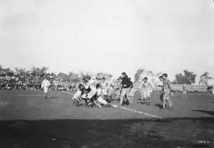 Image 5A game between the Hamilton Tigers and the Ottawa Rough Riders, 1910 (from Canadian football)