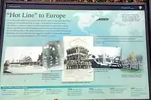 "Hot Line to Europe."  The Park Service provides general information about the radio station and a timeline of military facilities in Acadia, plus several photos:  Otter Cliffs administration building and radio tower; Allessandro Fabbri stands with Chief Electrician H. W. Castner and Electrician First Class C. C. Chisholm; Lieutenant Fabbri poses with his officers and crew; a radioman listens for long-wave messages at Otter Cliffs; Rockefeller Hall formerly housed Navy personnel on the Schoodic Peninsula.