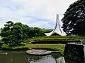 Our Lady of Lourdes Chapel viewed from across the river in 2022