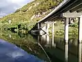 River under new road bridge