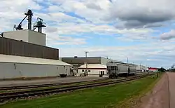 Former Owens-Illinois glass plant in Scoudouc, New Brunswick. It was constructed in an aircraft hangar, part of an abandoned World War II air base. O-I was the latest in a long list of owners of the glass manufacturing plant.