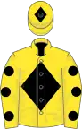 Yellow, black diamond, yellow sleeves, black spots, yellow cap, black diamond