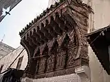 Wooden canopy over the entrance of the 14th-century Mosque of Abu al-Hasan