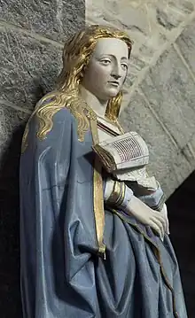 A late gothic sculpture by Jean Delemer, showing the Annunciation