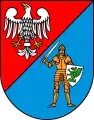 The coat of arms of the Pruszków County.