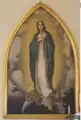 The large oil painting of the Blessed Virgin was painted over 100 years ago by Sacred Heart nun, Mother Mary Zahel. A school pupil, Rita de Lange was used to pose for the face. The painting has adorned both churches.