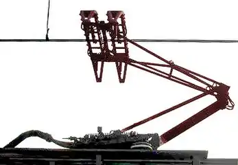 Modern one-arm “pantograph” collector with double collector shoes