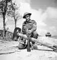 A Canadian soldier with a captured Panzerschrek