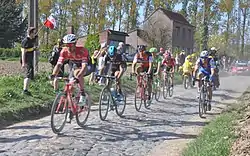 The winning breakaway in Bourghelles, at 26 km (16 mi) from the finish. From left to right: Jasper Stuyven, Gianni Moscon, Greg Van Avermaet, Sebastian Langeveld, Jürgen Roelandts and Zdeněk Štybar