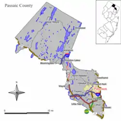 Location of Paterson in Passaic County highlighted in yellow (left). Inset map: Location of Passaic County in New Jersey highlighted in black (right).