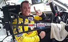 Paul Brown sitting in #50 Boss 302S after Laguna Seca victory