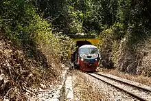 A train passing the Pengalat Railway Tunnel between Kawang and Papar. View from Kawang side.