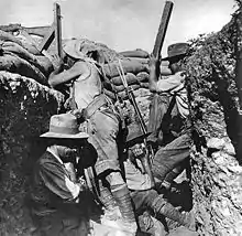 Australian Light Horse troops using a periscope rifle, Gallipoli, 1915. Photograph by Ernest Brooks.