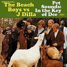 An edited version of The Beach Boys's Pet Sounds album cover. The Beach Boys are at the zoo, feeding apples to goats, while J Dilla stands behind them. The header reads "Bullion Presents... The Beach Boys vs J Dilla" and "Pet Sounds: In the Key of Dee".