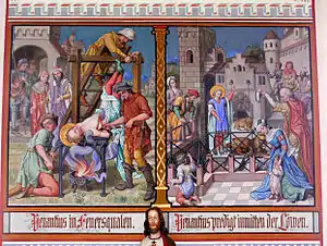 St. Venantius of Camerino is hung upside-down over a fire, and then thrown to the lions.