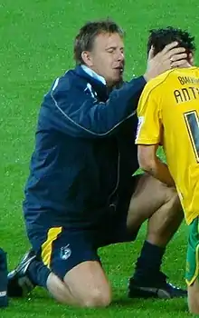 Football physiotherapist Phil Kite attending to an injured player