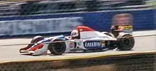 The absorption of the BMS Scuderia Italia team into Minardi for 1994 resulted in sponsorship from many Italian companies. This is Pierluigi Martini driving the Minardi M194 at the 1994 British Grand Prix.