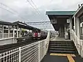 View from Platform 3, The island platform is to the left, with the station building beyond.