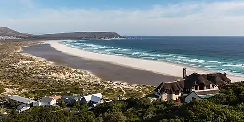 Noordhoek Beach from Chapman's Peak Drive with Kommetjie in the distance.