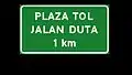 Toll plaza 1 kilometer ahead with name, using LLM Normal