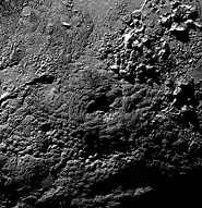 Pluto's possible cryovolcano Wright Mons, showing its central depression