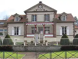 The town hall and school in Poigny-la-Forêt