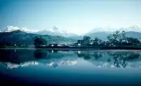 Reflection of Annapurna range in the lake