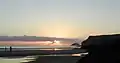 Puffin island and Pentire Point at sunset.