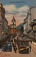 Postal of the Calle Real and the church from the 1940s.