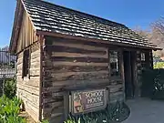 Replica of Prescott's first 1872 community schoolhouse.