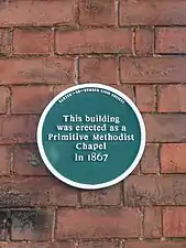 Blue plaque erected on the building by the Barton Civic Society