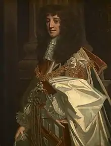 This painting of Prince Rupert shows an older man, posed sideways to the viewer. He is dressed in full state regalia, with gold chains and expensive clothes. His hair is long, black and curled. He looks older, but his facial experience looks slightly sardonic.