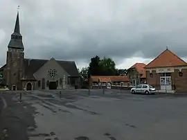 The town hall and church of Pronville