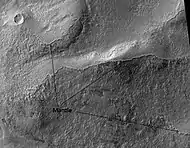 Ptolemaeus Crater Rim. Click on image to see excellent view of mantle deposit. Location is Phaethontis quadrangle.