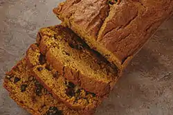 A delicious loaf of homemade pumpkin walnut bread.