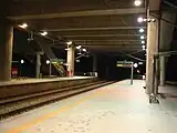 The Putrajaya & Cyberjaya ERL Station platform at night.