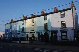 Row of colourful town houses on Queen's Avenue, Bicester