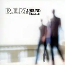 A blurred photo of three humans on a white background