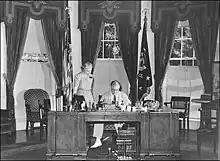 Franklin D. Roosevelt seated at the Hoover Desk