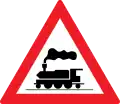 Level crossing without gates or barriers ahead