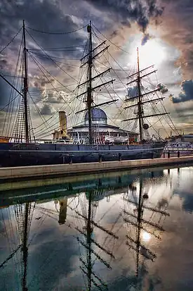 Image 9RRS Discovery  was the last traditional wooden three-masted ship to be built in Britain. Designed for Antarctic research, she was launched as a Royal Research Ship (RRS) in 1901. Her first mission was the British National Antarctic Expedition, carrying Robert Falcon Scott and Ernest Shackleton on their first, successful journey to the Antarctic, known as the Discovery Expedition. She is now the centrepiece of a visitor attraction in her home, Dundee.Photo credit: Mactographer