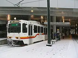 A northbound D-Line train to 30th & Downing at the Convention Center station on its first day of operation.