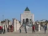 Mausoleum of Mohammed V seen through the mosque ruins