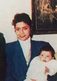 Raghad Saddam Hussein posing with family in the late 1980s